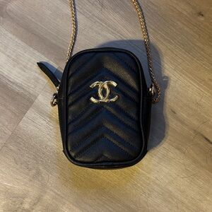 CHANEL Chevron Black Crossbody Bag with Gold Accents